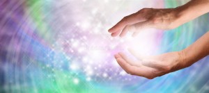 healing-hands-sparkling-energy-close-up-cupped-beautiful-swirling-colored-wide-background-40930239